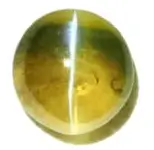 Natural cats eye gemstone cabochon cut with light band effect transparent background Ketu gemstone